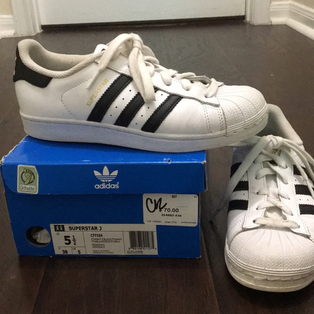 Adidas superstar shoes.